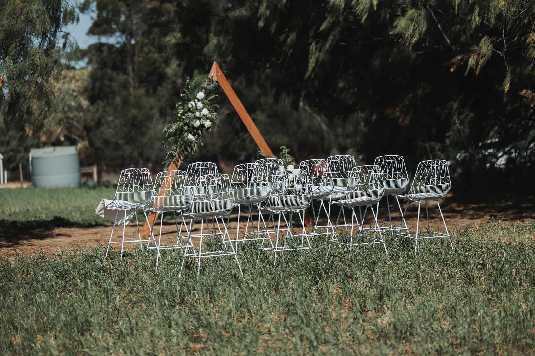 Wedding ceremony arbour and chairs