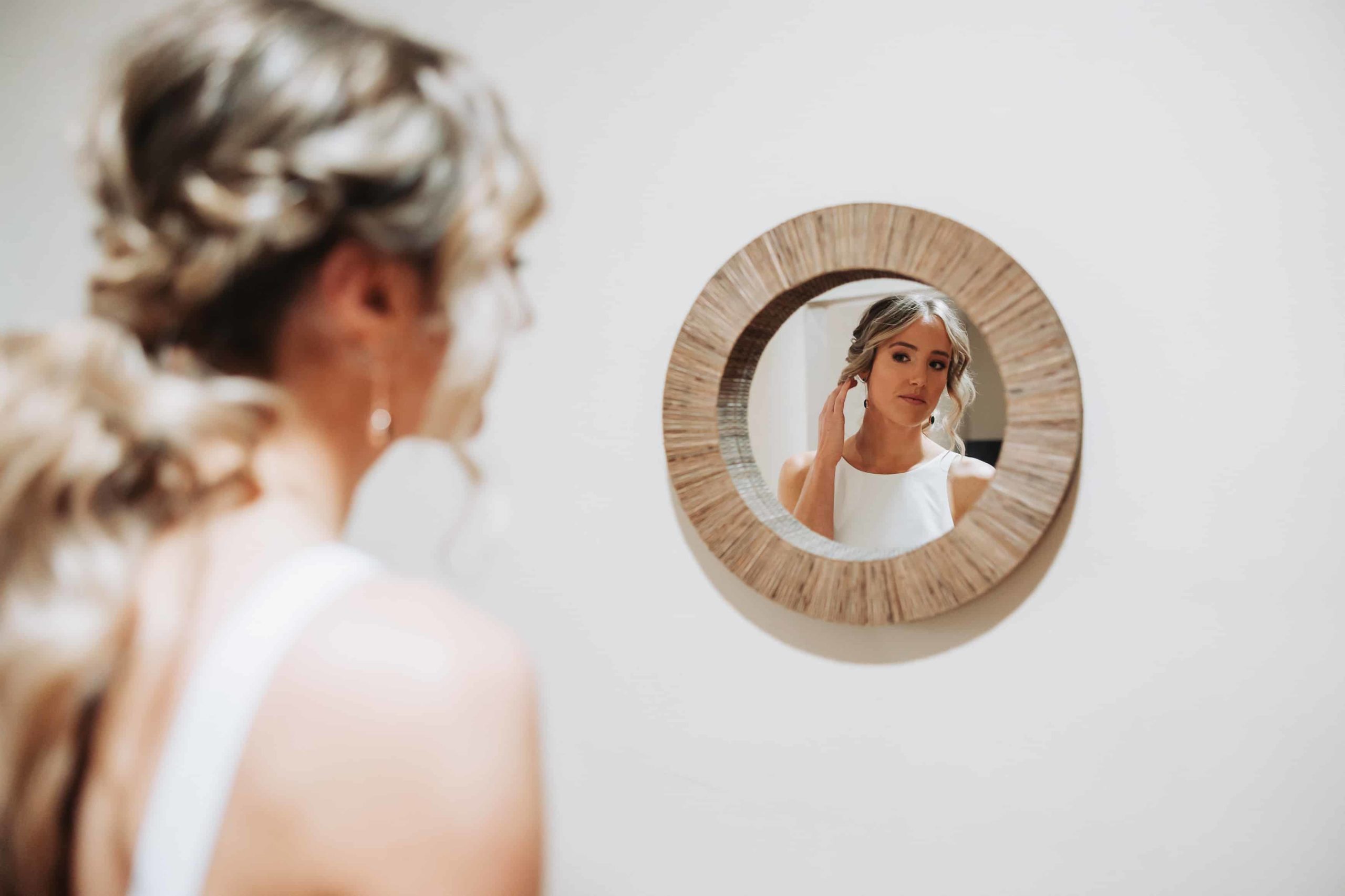 Bride image in round mirror