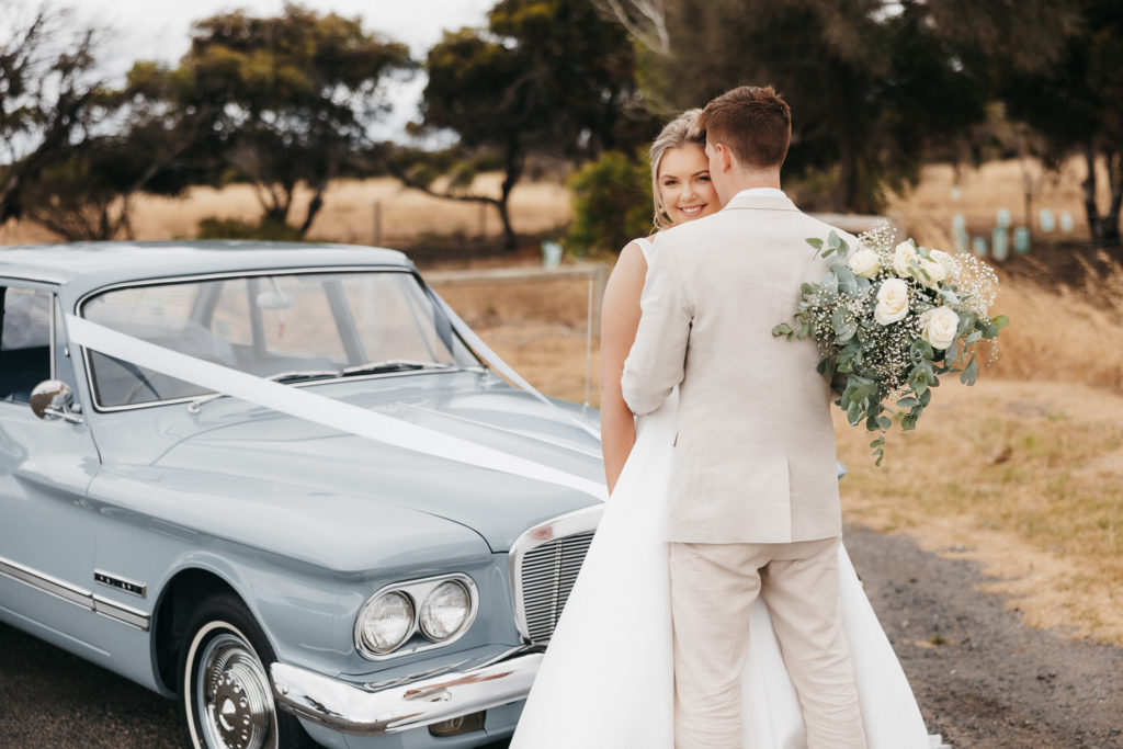 Vintage Wedding Car Bride and Groom